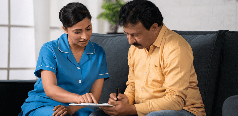Elderly Man with Homecare Giver