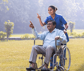 Senior smiling with caregiver